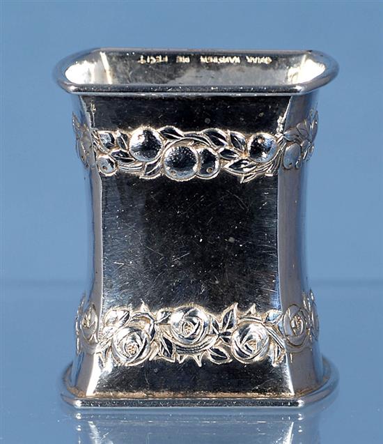 A 1930s Arts & Crafts planished silver waisted napkin ring, by Omar Ramsden. Height 58mm weight 2oz/64grms